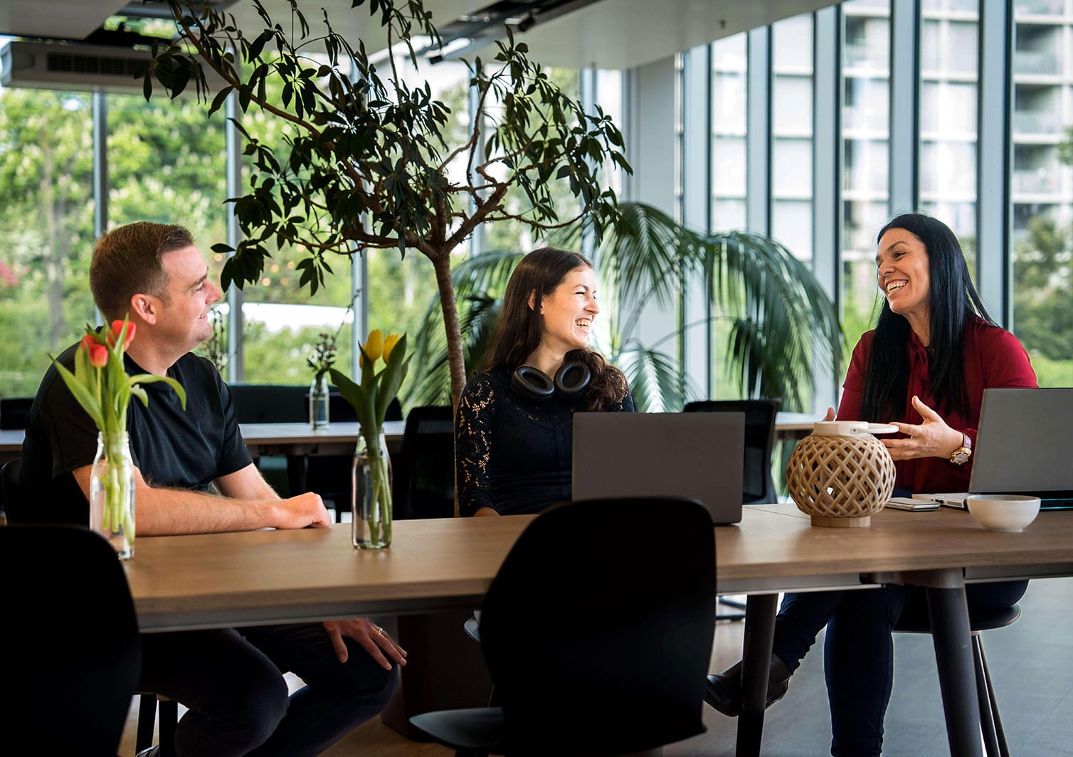 Photo of three team members talking at Sony Research's HQ